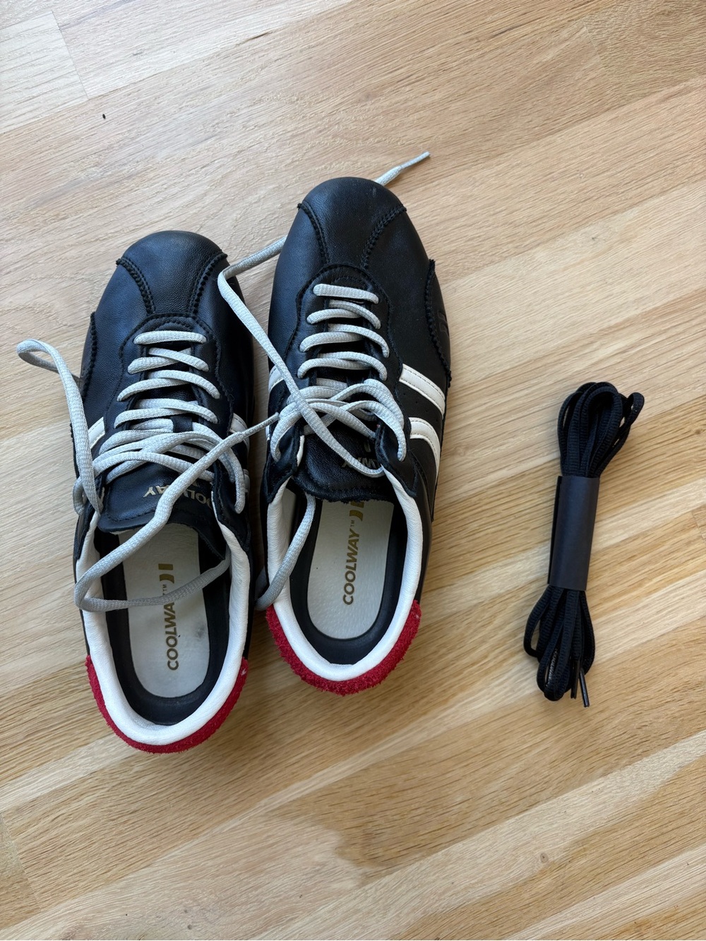 Women’s Coolway Black Sneakers with White Stripes and Red Heel Accent